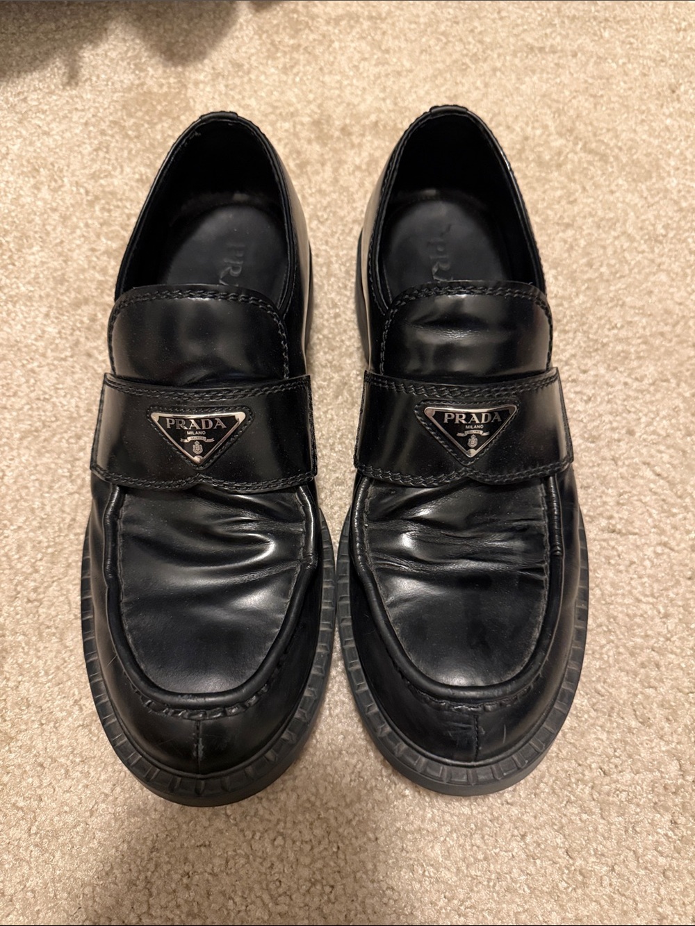 Prada Black Leather Penny Loafers with Triangular Logo